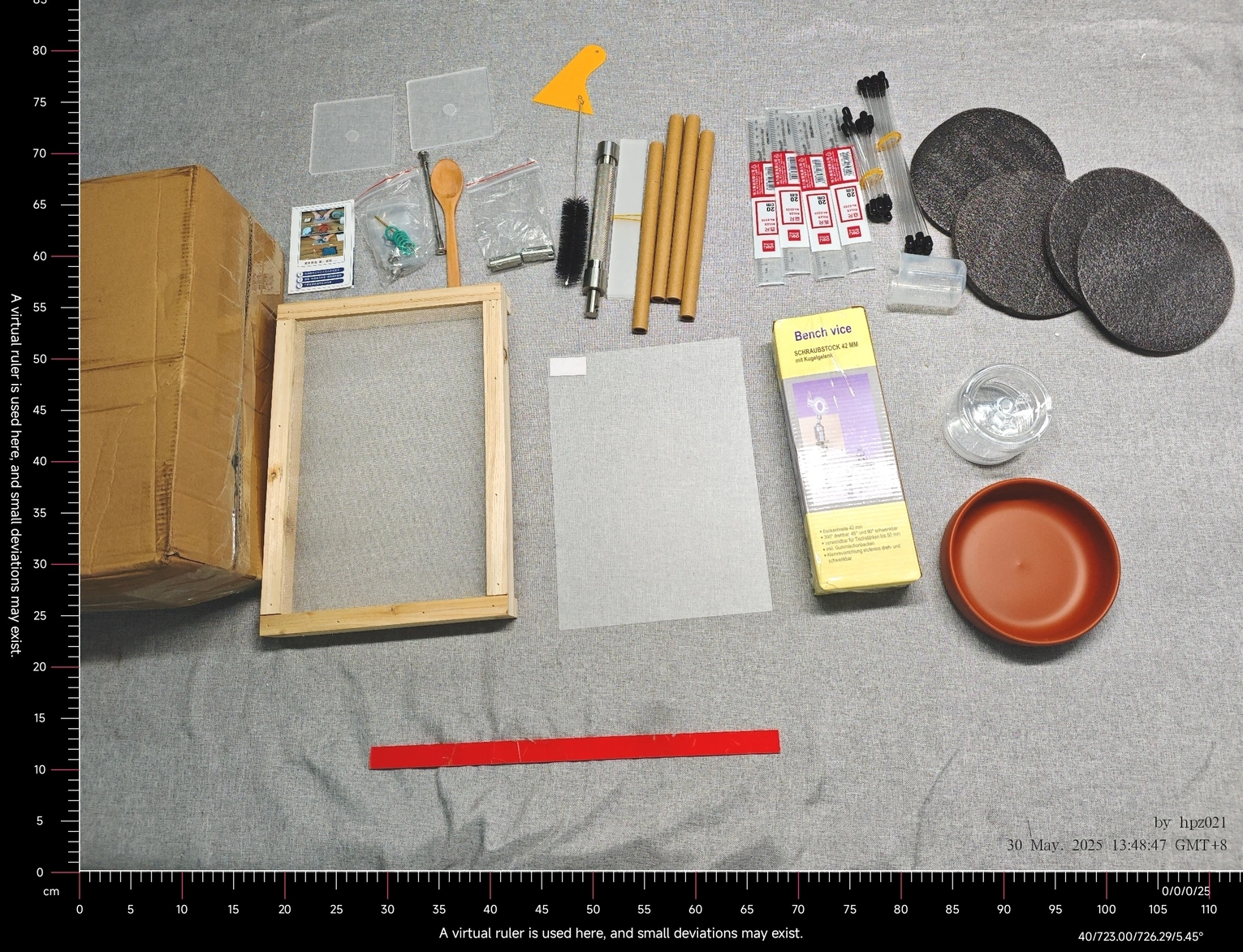 1748618236248-copy.webp {The full contents of my order on a table with a digital ruler.}