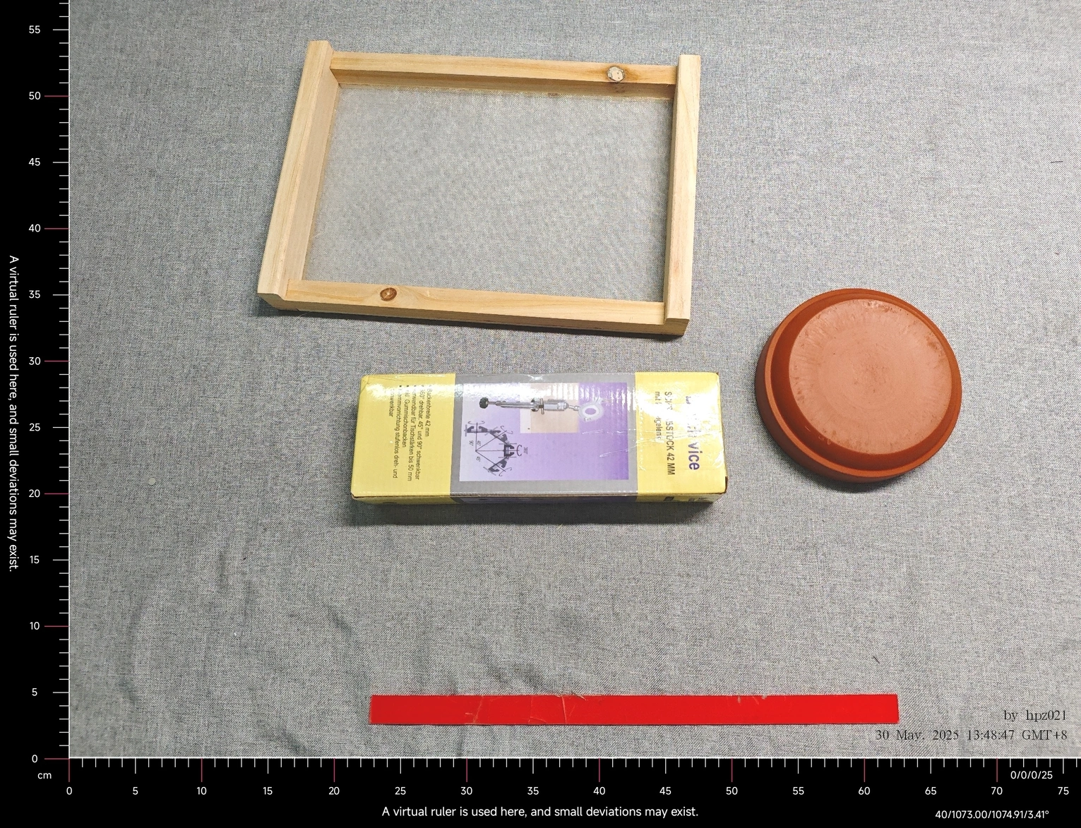1748618240216-copy.webp {A drying net, bowl, and vise.}