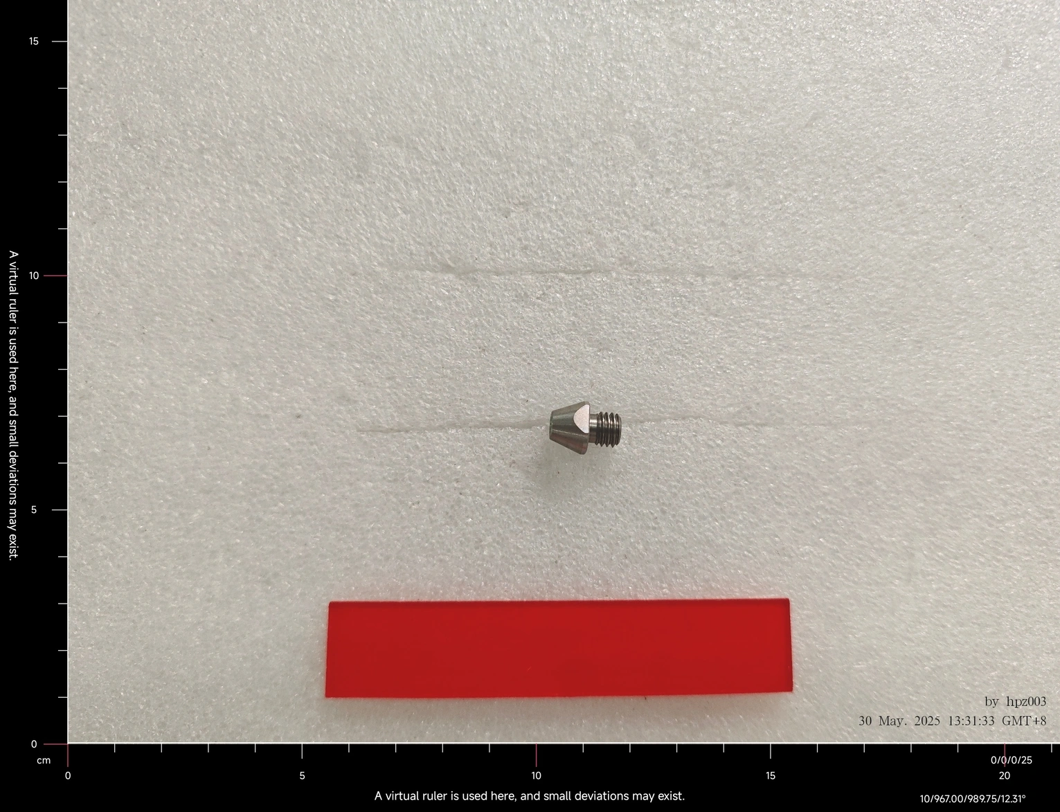 1748618245561-copy.webp {An extruder tip.}
